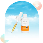 Aspen Green Extra Citrus CBD Oil tincture bottle with a dropper leaning against the bottle.