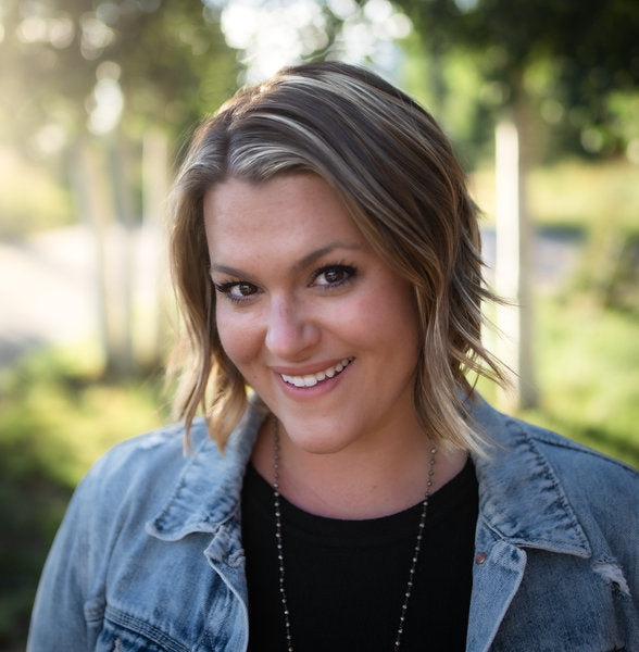 Valerie Chong wearing a denim jacket outdoors